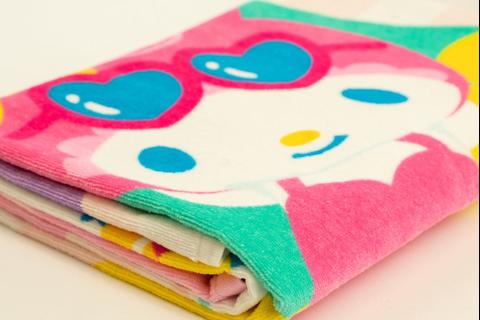 1969-hello-kitty-and-friends-ice-cream-float-beach-towel-1.png