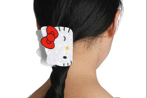 3149-hello-kitty-winking-hair-clip-1.jpg